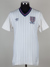 Terry Butcher white and blue No.6 England v. Poland match worn short-sleeved shirt, World Cup 1986